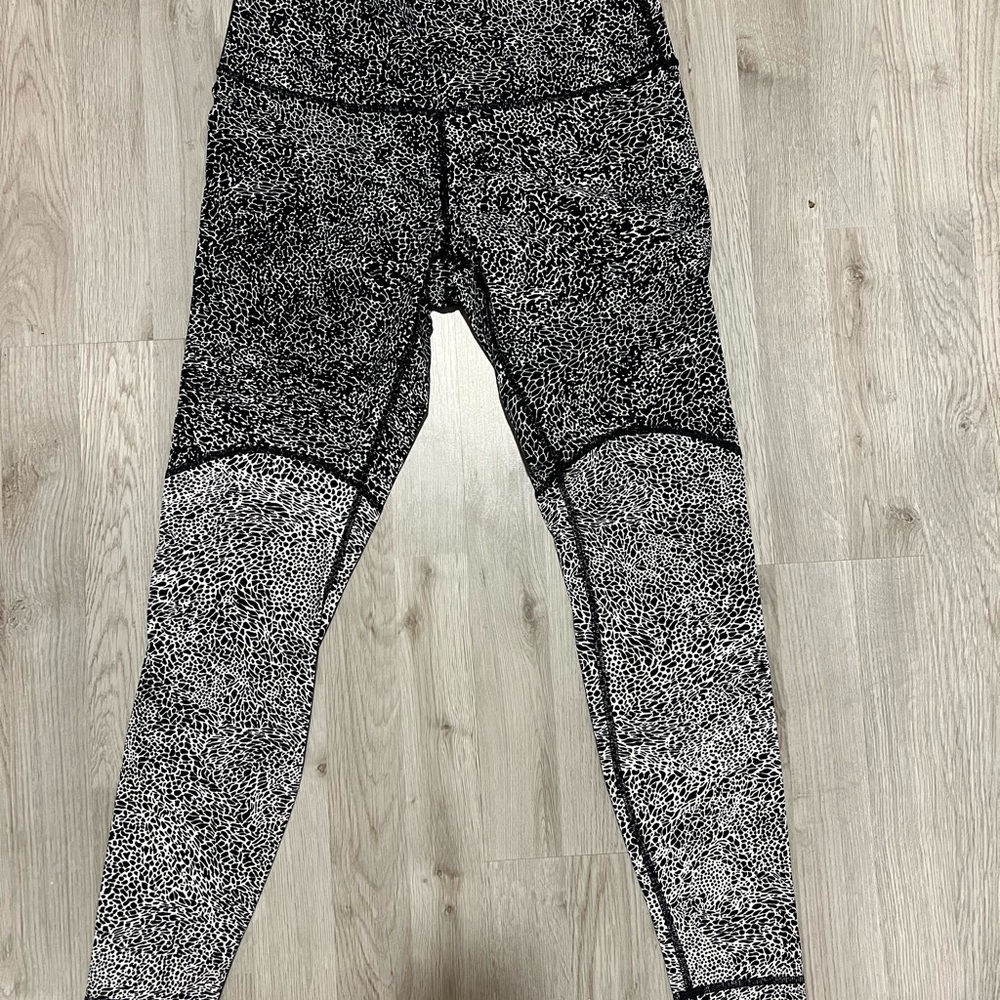 Size 10 Lululemon Wunder Under 26-28” High Rise Leggings.